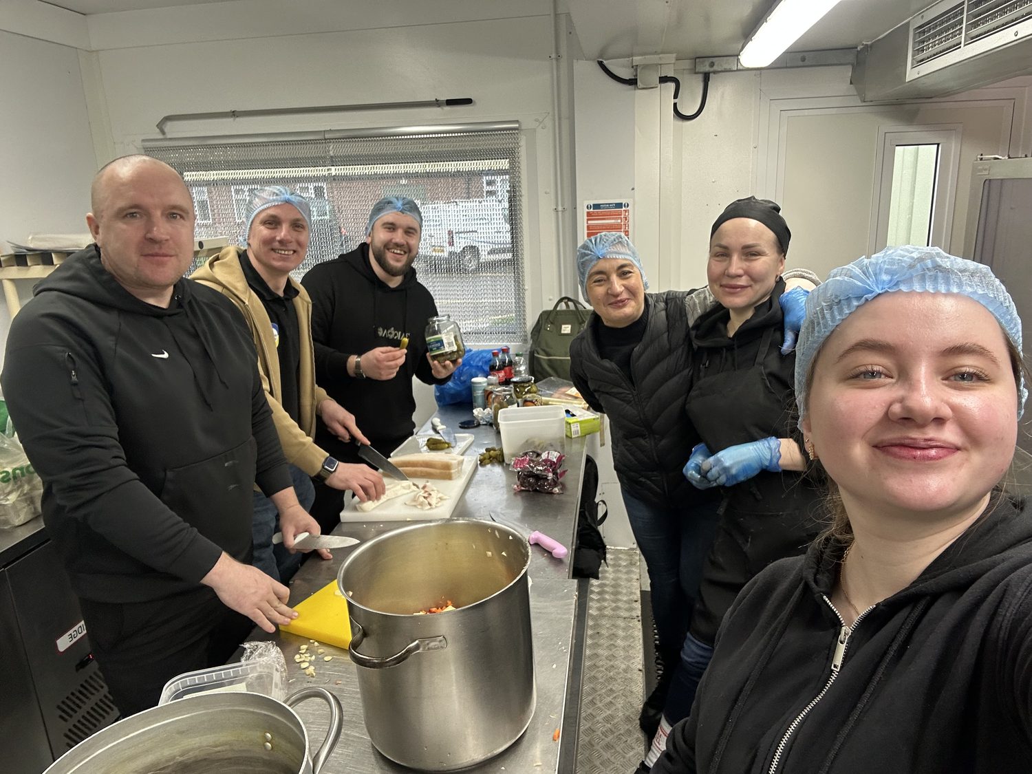 Volunteers preparing borshch for Ukrainian defenders