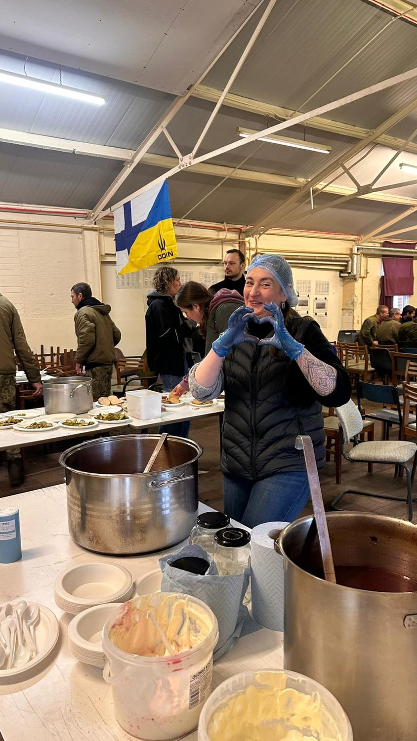 Volunteers preparing borshch for Ukrainian defenders