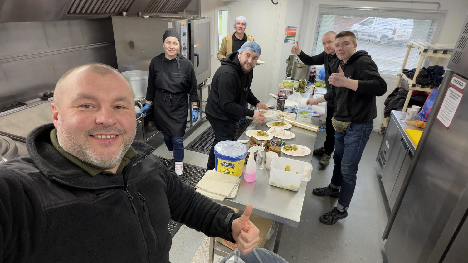Volunteers preparing borshch for Ukrainian defenders
